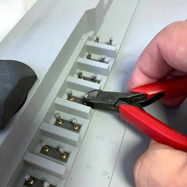 Remove probe by gently pulling out using pliers