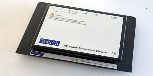 AT CALIBRATION FIXTURE